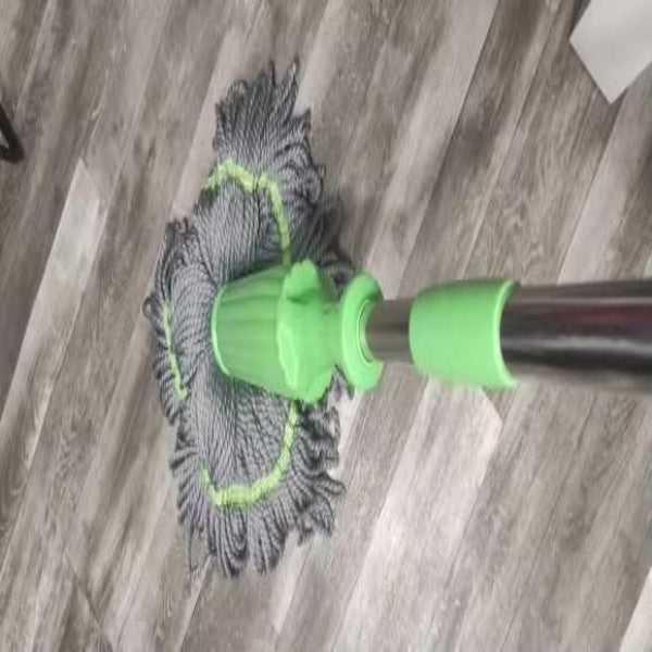 Self-Wringing Spin Mop